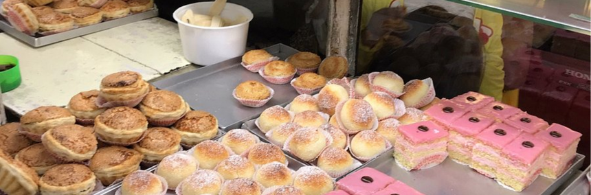 delicious cakes kept in trays in a bakery in Kolkata