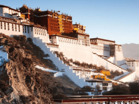 The Leh Monastery, an exquisite building, rises beautifully amidst the mountains, showcasing its rich cultural heritage.
