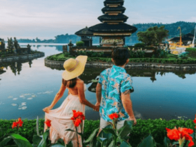 A couple walking in front of iconic landmarks, cultural sites, and vibrant nature scenes.