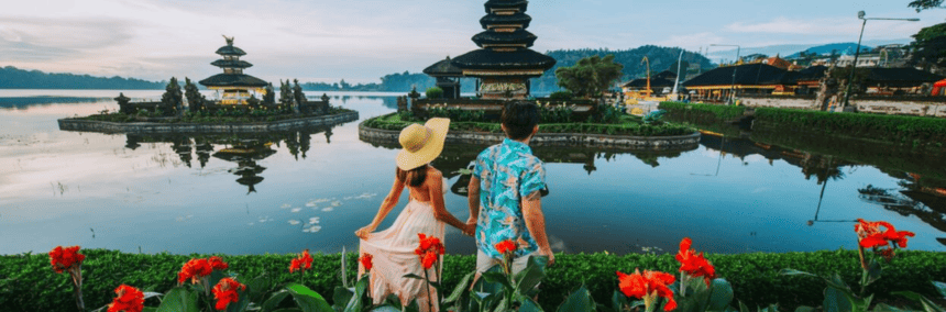 A couple walking in front of iconic landmarks, cultural sites, and vibrant nature scenes.